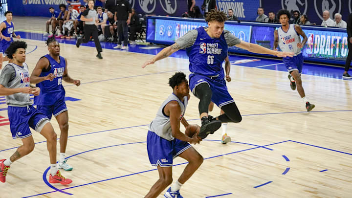 May 15, 2024; Chicago, IL, USA; Coleman Hawkins (66) and Nae’Qwan Tomlin (10) participate during the 2024 NBA Draft Combine at Wintrust Arena. Mandatory Credit: David Banks-Imagn Images