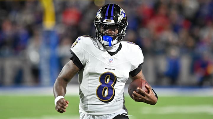 Sep 7, 2025; Orchard Park, New York, USA; Baltimore Ravens quarterback Lamar Jackson (8) runs with the ball against the Buffalo Bills during the second quarter at Highmark Stadium. Mandatory Credit: Mark Konezny-Imagn Images Sep 7, 2025; Orchard Park, New York, USA; Baltimore Ravens quarterback Lamar Jackson (8) runs with the ball against the Buffalo Bills during the second quarter at Highmark Stadium. Mandatory Credit: Mark Konezny-Imagn Images