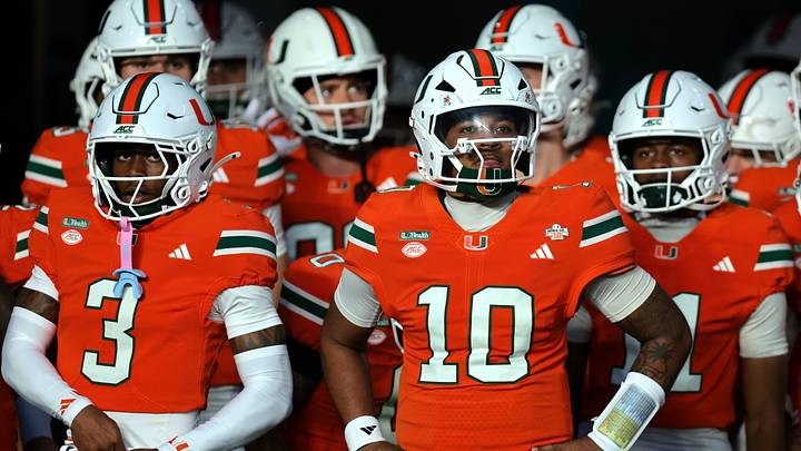 Oct 17, 2026; Miami Gardens, Florida, USA;  Miami Hurricanes quarterback Darian Mensah (10) and wide receiver Joshua Moore (3) prepare to take the field before a game against the Florida State Seminoles at Hard Rock Stadium.  Mandatory Credit: Sam Navarro-Imagn Images