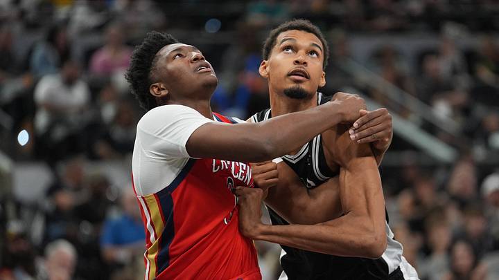 Nov 8, 2025; San Antonio, Texas, USA; New Orleans Pelicans center Derik Queen (22) and San Antonio Spurs forward Victor Wembanyama (1) battle for position in the second half at Frost Bank Center. Mandatory Credit: Daniel Dunn-Imagn Images Nov 8, 2025; San Antonio, Texas, USA; New Orleans Pelicans center Derik Queen (22) and San Antonio Spurs forward Victor Wembanyama (1) battle for position in the second half at Frost Bank Center. Mandatory Credit: Daniel Dunn-Imagn Images