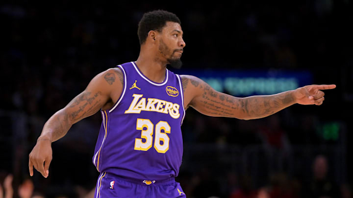 Dec 10, 2025; Los Angeles, California, USA;  Los Angeles Lakers guard Marcus Smart (36) reacts after a 3-point basket during the second half against the San Antonio Spurs at Crypto.com Arena. Mandatory Credit: Jayne Kamin-Oncea-Imagn Images