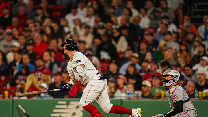 Sep 9, 2024; Boston, Massachusetts, USA; Boston Red Sox designated hitter Tyler O'Neill (17) hits a home run against the Baltimore Orioles in the eighth inning at Fenway Park. Sep 9, 2024; Boston, Massachusetts, USA; Boston Red Sox designated hitter Tyler O'Neill (17) hits a home run against the Baltimore Orioles in the eighth inning at Fenway Park.