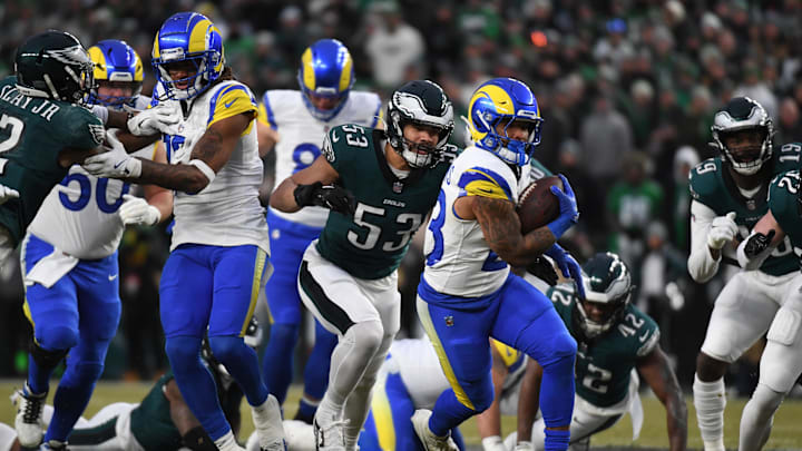 Jan 19, 2025; Philadelphia, Pennsylvania, USA; Los Angeles Rams running back Kyren Williams (23) carries the ball past Philadelphia Eagles linebacker Zack Baun (53) in a 2025 NFC divisional round game at Lincoln Financial Field. Mandatory Credit: Eric Hartline-Imagn Images Jan 19, 2025; Philadelphia, Pennsylvania, USA; Los Angeles Rams running back Kyren Williams (23) carries the ball past Philadelphia Eagles linebacker Zack Baun (53) in a 2025 NFC divisional round game at Lincoln Financial Field. Mandatory Credit: Eric Hartline-Imagn Images