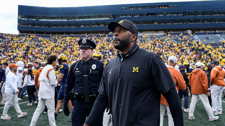 Michigan coach Sherrone Moore walks off the field after his team's 31-12 loss to Texas at Michigan Stadium in Ann Arbor on Saturday, Sept. 7, 2024.