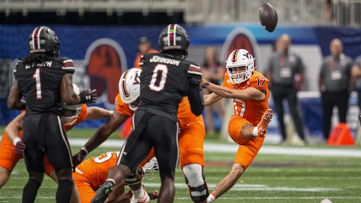 Aug 31, 2025; Atlanta, Ga.; Virginia Tech place kicker John Love (17) kicks a 56-yard field goal against South Carolina on the final play of the first half at Mercedes-Benz Stadium.