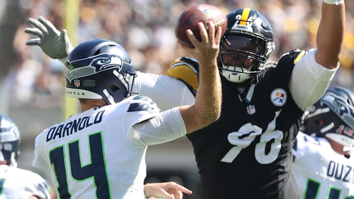 Sep 14, 2025; Pittsburgh, Pennsylvania, USA;  Pittsburgh Steelers defensive tackle Daniel Ekuale (96) pressures Seattle Seahawks quarterback Sam Darnold (14) during the third quarter at Acrisure Stadium. Mandatory Credit: Charles LeClaire-Imagn Images