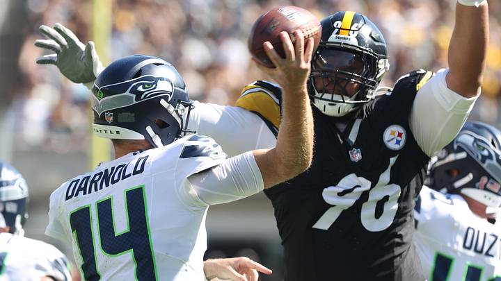 Pittsburgh Steelers defensive tackle Daniel Ekuale (96) pressures Seattle Seahawks quarterback Sam Darnold (14) during the third quarter at Acrisure Stadium. Pittsburgh Steelers defensive tackle Daniel Ekuale (96) pressures Seattle Seahawks quarterback Sam Darnold (14) during the third quarter at Acrisure Stadium.