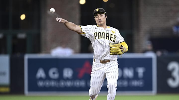 San Diego Padres shortstop Ha-Seong Kim (7) throws to first base against the Pittsburgh Pirates during the third inning at Petco Park in 2024.