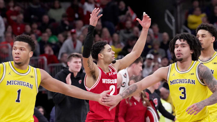 Wisconsin guard Nick Boyd (2) urges on Wisconsin fans during the first half of their semifinal game against Michigan in the Big Ten tournament Saturday, March 14, 2026 at the United Center in Chicago, Illinois.