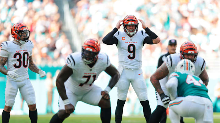 Dec 21, 2025; Miami Gardens, Florida, USA; Cincinnati Bengals quarterback Joe Burrow (9) reacts before the play during the second quarter against the Miami Dolphins at Hard Rock Stadium. Mandatory Credit: Sam Navarro-Imagn Images