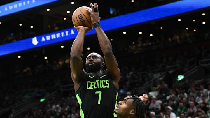 Nov 16, 2024; Boston, Massachusetts, USA; Boston Celtics guard Jaylen Brown (7) attempts a three-point basket against the Toronto Raptors during the first half at the TD Garden. Mandatory Credit: Brian Fluharty-Imagn Images