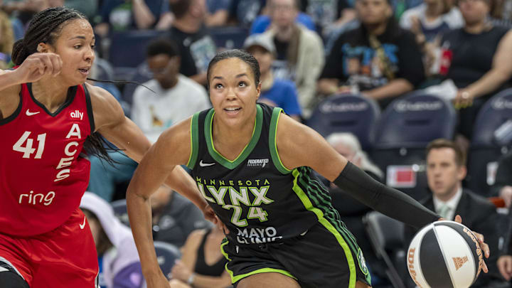 Jun 17, 2025; Minneapolis, Minnesota, USA; Minnesota Lynx forward Napheesa Collier (24) dribbles the ball past Las Vegas Aces center Kiah Stokes (41) in the second half at Target Center. Mandatory Credit: Jesse Johnson-Imagn Images Jun 17, 2025; Minneapolis, Minnesota, USA; Minnesota Lynx forward Napheesa Collier (24) dribbles the ball past Las Vegas Aces center Kiah Stokes (41) in the second half at Target Center. Mandatory Credit: Jesse Johnson-Imagn Images