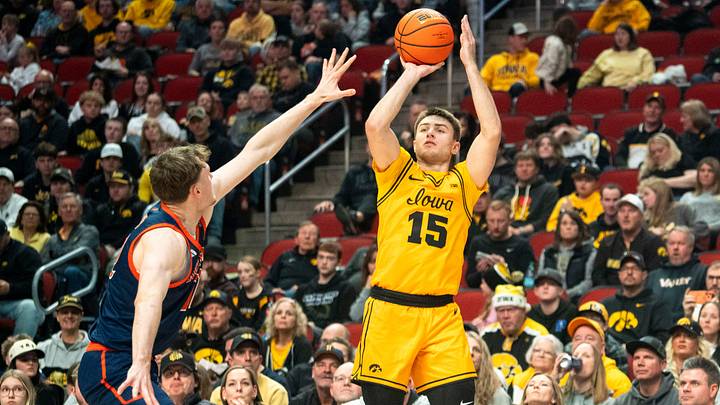 Iowa's Brendan Hausen attempts a basket during a game at Casey's Center on Saturday, Dec. 20, 2025 in Des Moines.