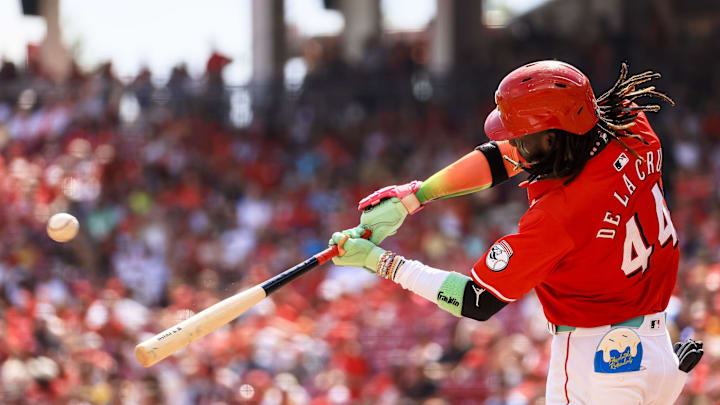 Sep 21, 2024; Cincinnati, Ohio, USA; Cincinnati Reds shortstop Elly De La Cruz (44) hits a double in the third inning against the Pittsburgh Pirates at Great American Ball Park. Mandatory Credit: Katie Stratman-Imagn Images