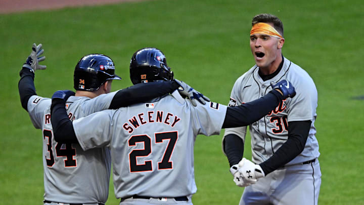 Oct 7, 2024; Cleveland, Ohio, USA; Detroit Tigers outfielder Kerry Carpenter (30) celebrates with catcher Jake Rogers (34) and shortstop Trey Sweeney (27) after hitting a three run home run during the ninth inning against the Cleveland Guardians during game two of the ALDS for the 2024 MLB Playoffs at Progressive Field. Mandatory Credit: David Richard-Imagn Images