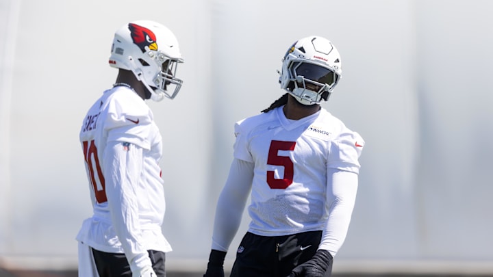 Jun 10, 2025; Tempe, AZ, USA; Arizona Cardinals linebacker Baron Browning (5) with Josh Sweat (10) during minicamp at the teams Arizona Cardinals Training Facility. Mandatory Credit: Mark J. Rebilas-Imagn Images