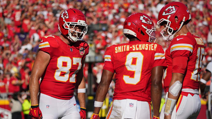Sep 28, 2025; Kansas City, Missouri, USA;  Kansas City Chiefs wide receiver JuJu Smith-Schuster (9) celebrates with Kansas City Chiefs tight end Travis Kelce (87) and Kansas City Chiefs quarterback Patrick Mahomes (15) after scoring a touchdown during the second quarter against the Baltimore Ravens at GEHA Field at Arrowhead Stadium. Mandatory Credit: Denny Medley-Imagn Images