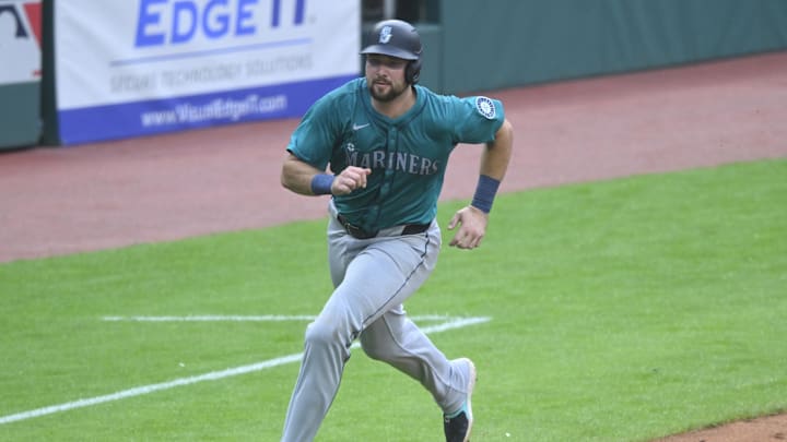 Seattle Mariners catcher Cal Raleigh (29) scores in the third inning against the Cleveland Guardians at Progressive Field in 2024.