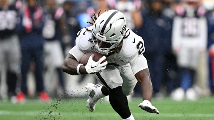 Sep 7, 2025; Foxborough, Massachusetts, USA; Las Vegas Raiders running back Ashton Jeanty (2) rushes the ball against the New England Patriots during the second half at Gillette Stadium. Mandatory Credit: Brian Fluharty-Imagn Images Sep 7, 2025; Foxborough, Massachusetts, USA; Las Vegas Raiders running back Ashton Jeanty (2) rushes the ball against the New England Patriots during the second half at Gillette Stadium. Mandatory Credit: Brian Fluharty-Imagn Images