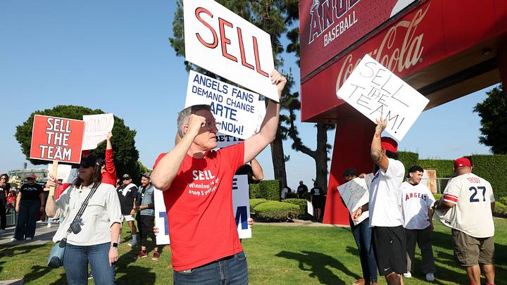 May 23, 2026; Anaheim, California, USA; Los Angeles Angels fans gather outside Angel Stadium before the game between the Los Angeles Angels and the Texas Rangers to protest the Angels team owner Arte Moreno. Mandatory Credit: Kiyoshi Mio-Imagn Images May 23, 2026; Anaheim, California, USA; Los Angeles Angels fans gather outside Angel Stadium before the game between the Los Angeles Angels and the Texas Rangers to protest the Angels team owner Arte Moreno. Mandatory Credit: Kiyoshi Mio-Imagn Images