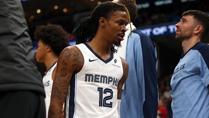 Dec 5, 2024; Memphis, Tennessee, USA; Memphis Grizzlies guard Ja Morant (12) walks off the court after being ejected during the fourth quarter against the Sacramento Kings at FedExForum. Mandatory Credit: Petre Thomas-Imagn Images Dec 5, 2024; Memphis, Tennessee, USA; Memphis Grizzlies guard Ja Morant (12) walks off the court after being ejected during the fourth quarter against the Sacramento Kings at FedExForum. Mandatory Credit: Petre Thomas-Imagn Images