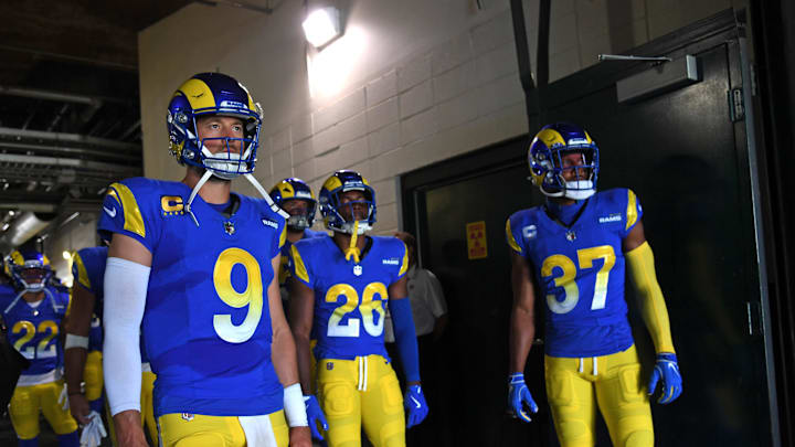 Sep 21, 2025; Philadelphia, Pennsylvania, USA; Los Angeles Rams quarterback Matthew Stafford (9), safety Kamren Kinchens (26) and safety Quentin Lake (37) wait in the tunnel against the Philadelphia Eagles at Lincoln Financial Field. Mandatory Credit: Eric Hartline-Imagn Images