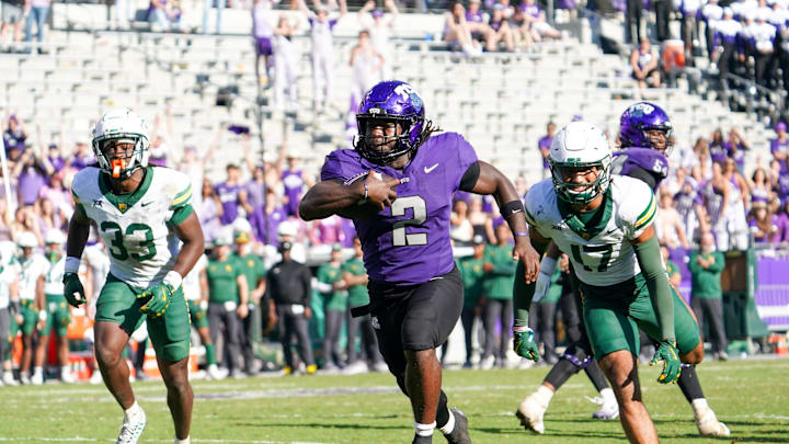 Oct 18, 2025; Fort Worth, Texas, USA; TCU Horned Frogs running back Kevorian Barnes (2) carries the ball for a touchdown Baylor Bears during the second half of a game at Amon G. Carter Stadium. Mandatory Credit: Raymond Carlin III-Imagn Images Oct 18, 2025; Fort Worth, Texas, USA; TCU Horned Frogs running back Kevorian Barnes (2) carries the ball for a touchdown Baylor Bears during the second half of a game at Amon G. Carter Stadium. Mandatory Credit: Raymond Carlin III-Imagn Images