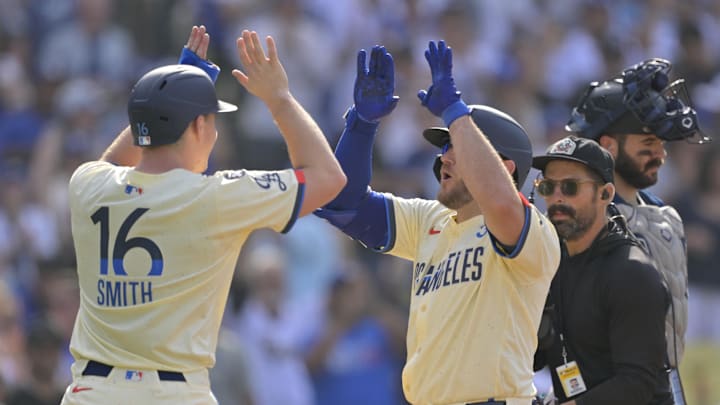 May 31, 2025; Los Angeles, California, USA; Los Angeles Dodgers third baseman Max Muncy (13) celebrates with catcher Will Smith (16) after a three run home run against the New York Yankees in the second inning at Dodger Stadium. Mandatory Credit: Jayne Kamin-Oncea-Imagn Images