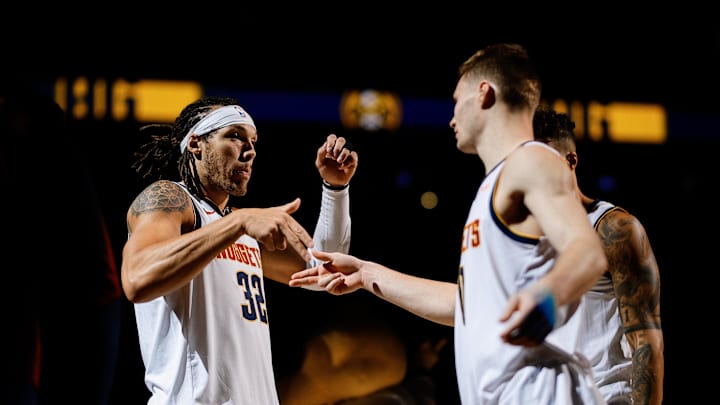 Denver Nuggets forward Aaron Gordon (32) and guard Christian Braun (0) before the game against the Toronto Raptors at Ball Arena. Denver Nuggets forward Aaron Gordon (32) and guard Christian Braun (0) before the game against the Toronto Raptors at Ball Arena.