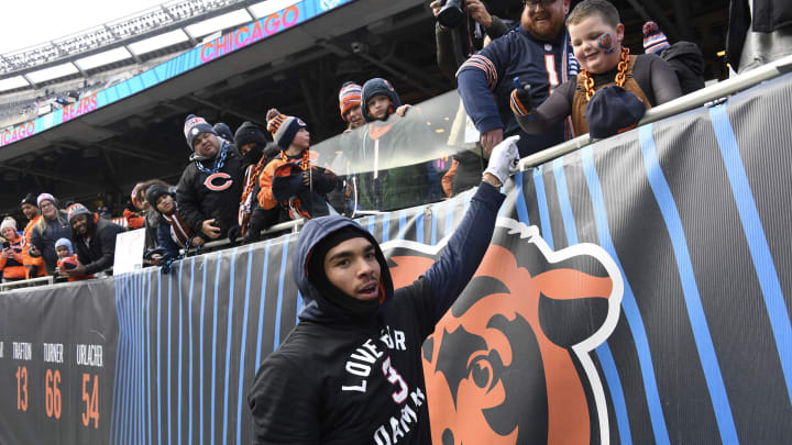Jan 8, 2023; Chicago, Illinois, USA;  Chicago Bears wide receiver Chase Claypool (10) high-fives fans before the team's game against the Minnesota Vikings at Soldier Field. Mandatory Credit: Matt Marton-USA TODAY Sports