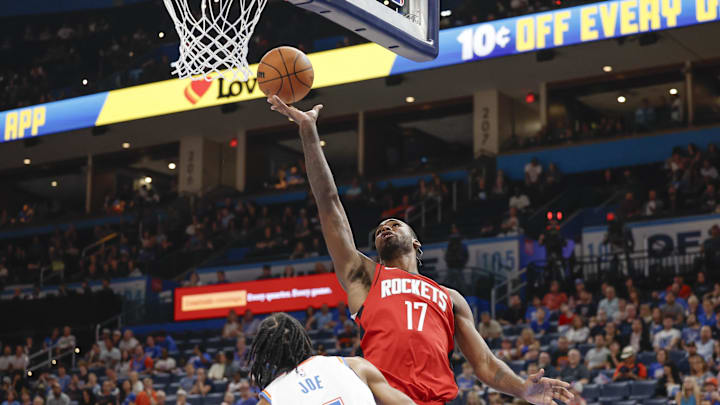 Oct 9, 2024; Oklahoma City, Oklahoma, USA; Houston Rockets forward Tari Eason (17) shoots over Oklahoma City Thunder guard Isaiah Joe (11) during the second half at Paycom Center. Mandatory Credit: Alonzo Adams-Imagn Images
