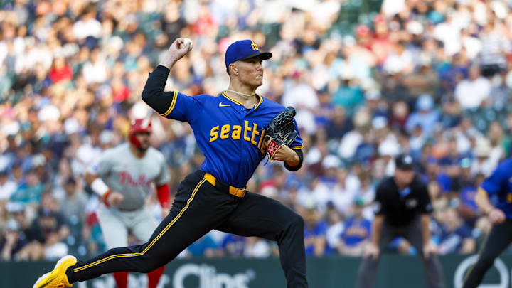 Aug 2, 2024; Seattle, Washington, USA; Seattle Mariners starting pitcher Bryan Woo (22) throws against the Philadelphia Phillies during the first inning at T-Mobile Park. Mandatory Credit: Joe Nicholson-USA TODAY Sports