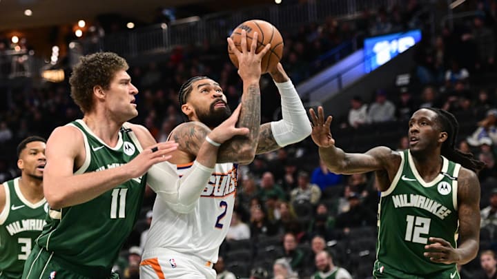 Phoenix Suns center Nick Richards takes a shot against Milwaukee Bucks center Brook Lopez. Mandatory Credit: Benny Sieu-Imagn Images Phoenix Suns center Nick Richards takes a shot against Milwaukee Bucks center Brook Lopez. Mandatory Credit: Benny Sieu-Imagn Images