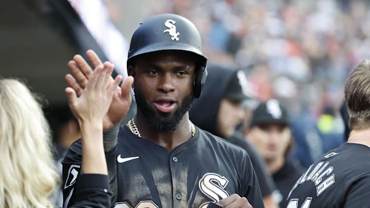Sep 29, 2024; Detroit, Michigan, USA;  Chicago White Sox center fielder Luis Robert Jr. (88) receives congratulations from teammates after scoring in the seventh inning against the Detroit Tigers at Comerica Park. Mandatory Credit: Rick Osentoski-Imagn Images