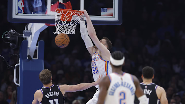 Oct 28, 2025; Oklahoma City, Oklahoma, USA; Oklahoma City Thunder center Isaiah Hartenstein (55) dunks against the Sacramento Kings during the second quarter at Paycom Center. Mandatory Credit: Alonzo Adams-Imagn Images