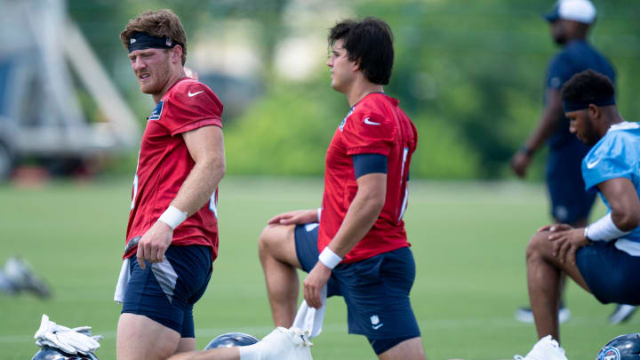 Quarterbacks Will Levis, left, and Mason Rudolph go through warmups during the Tennessee Titans mandatory mini-camp at Ascension Saint Thomas Sports Park in Nashville, Tenn., Thursday, June 6, 2024.