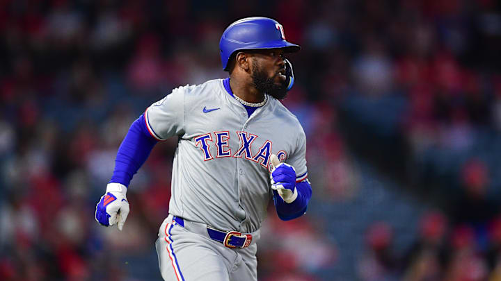 Texas Rangers right fielder Adolis Garcia (53) hits a solo home run against the Los Angeles Angels during the first inning at Angel Stadium on Sept 27.