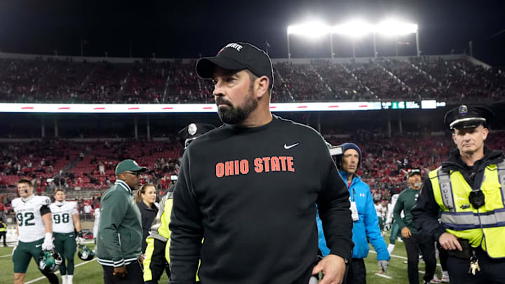 Nov. 11, 2023; Columbus, Oh., USA; 
Ohio State Buckeyes head coach Ryan Day waits to be interviewed at midfield following a 38-3 win in Saturday's NCAA Division I football game against the Michigan State Spartans at Ohio Stadium.