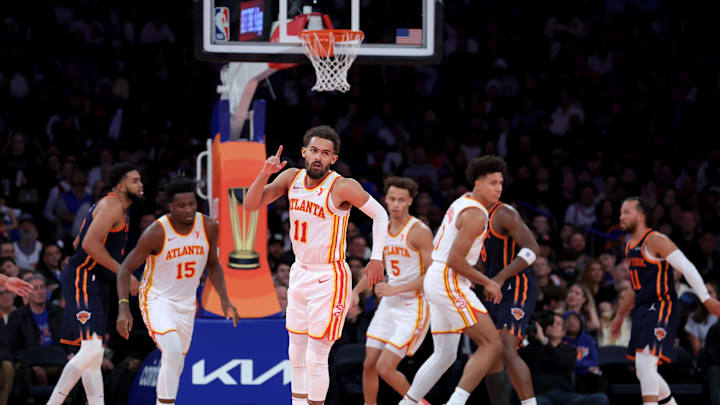 Dec 11, 2024; New York, New York, USA; Atlanta Hawks guard Trae Young (11) celebrates his three point shot against the New York Knicks during the third quarter at Madison Square Garden. Mandatory Credit: Brad Penner-Imagn Images Dec 11, 2024; New York, New York, USA; Atlanta Hawks guard Trae Young (11) celebrates his three point shot against the New York Knicks during the third quarter at Madison Square Garden. Mandatory Credit: Brad Penner-Imagn Images