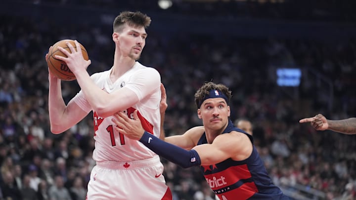 Mar 10, 2025; Toronto, Ontario, CAN; Washington Wizards guard Jaylen Martin (4) defends against Toronto Raptors center Colin Castleton (11) during the first half at Scotiabank Arena. Mandatory Credit: John E. Sokolowski-Imagn Images Mar 10, 2025; Toronto, Ontario, CAN; Washington Wizards guard Jaylen Martin (4) defends against Toronto Raptors center Colin Castleton (11) during the first half at Scotiabank Arena. Mandatory Credit: John E. Sokolowski-Imagn Images