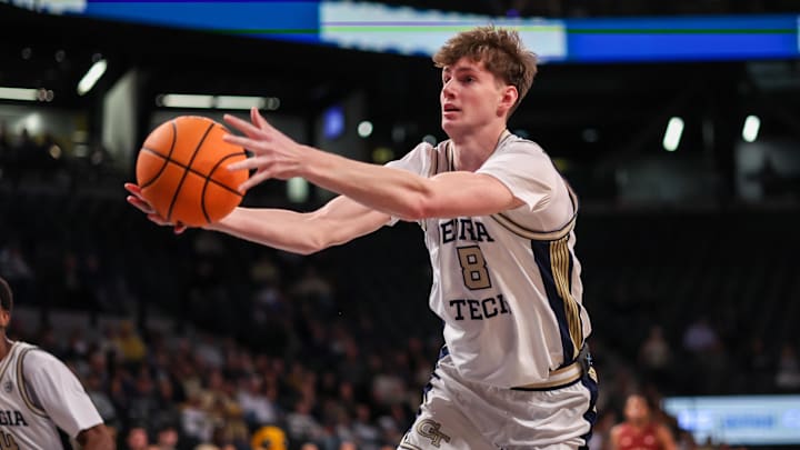 Jan 3, 2026; Atlanta, Georgia, USA; Georgia Tech Yellow Jackets center Cole Kirouac (8) grabs a rebound against the Boston College Eagles in the first half at McCamish Pavilion. Mandatory Credit: Brett Davis-Imagn Images