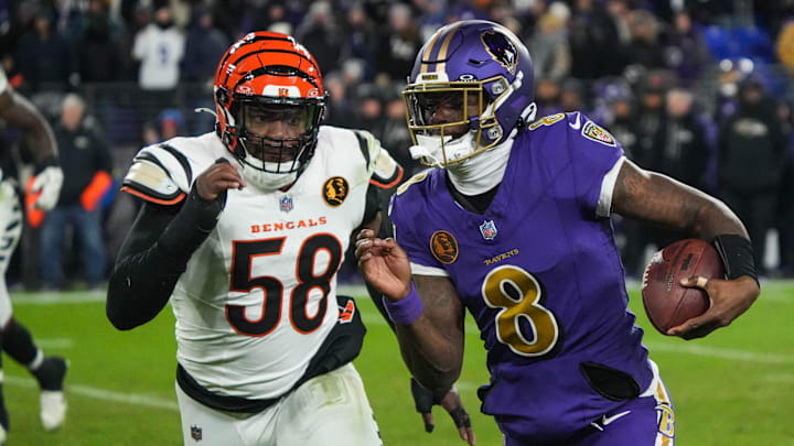 Bengals Joseph Ossai (58) rushes Ravens Lamar Jackson (8) during their game at M&T Bank Stadium on Thanksgiving Thursday November 27, 2025. The Bengals won the game with a final score of 33-14.