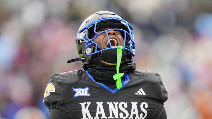 Nov 28, 2025; Lawrence, Kansas, USA; Kansas Jayhawks wide receiver Emmanuel Henderson Jr. (1) reacts during the second half against the Utah Utes at David Booth Kansas Memorial Stadium. Mandatory Credit: Jay Biggerstaff-Imagn Images Nov 28, 2025; Lawrence, Kansas, USA; Kansas Jayhawks wide receiver Emmanuel Henderson Jr. (1) reacts during the second half against the Utah Utes at David Booth Kansas Memorial Stadium. Mandatory Credit: Jay Biggerstaff-Imagn Images
