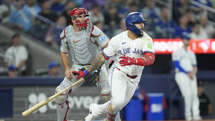 Jun 9, 2026; Toronto, Ontario, CAN; Toronto Blue Jays left fielder Yohendrick Pinango (24) hots a single against the Philadelphia Phillies during the ninth inning at Rogers Centre. Mandatory Credit: John E. Sokolowski-Imagn Images
