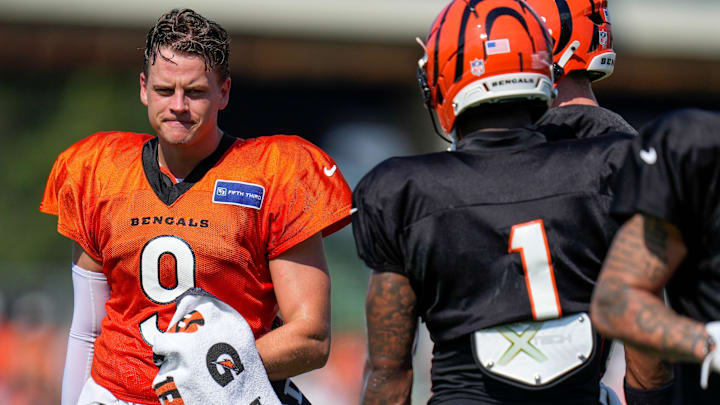 Cincinnati Bengals quarterback Joe Burrow (9) sets up between plays during a preseason training camp practice in downtown Cincinnati on Wednesday, July 30, 2025.
