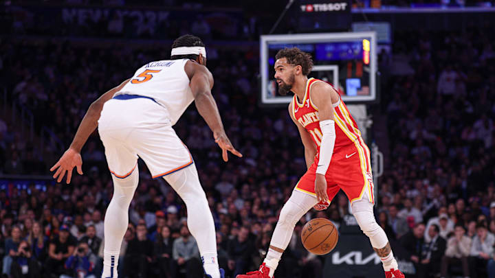 Jan 20, 2025; New York, New York, USA; Atlanta Hawks guard Trae Young (11) is guarded by New York Knicks forward Precious Achiuwa (5) during the second half at Madison Square Garden. Mandatory Credit: Vincent Carchietta-Imagn Images Jan 20, 2025; New York, New York, USA; Atlanta Hawks guard Trae Young (11) is guarded by New York Knicks forward Precious Achiuwa (5) during the second half at Madison Square Garden. Mandatory Credit: Vincent Carchietta-Imagn Images