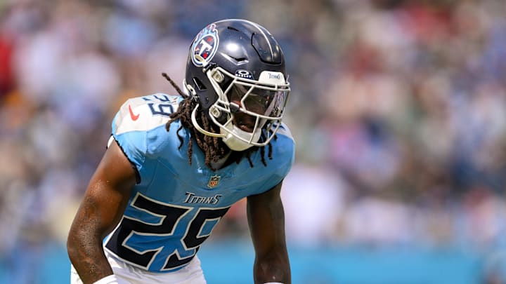 Sep 22, 2024; Nashville, Tennessee, USA; Tennessee Titans cornerback Jarvis Brownlee Jr. (29) sneaks a peak into the backfield against the Green Bay Packers during the first half at Nissan Stadium. Mandatory Credit: Steve Roberts-Imagn Images Sep 22, 2024; Nashville, Tennessee, USA; Tennessee Titans cornerback Jarvis Brownlee Jr. (29) sneaks a peak into the backfield against the Green Bay Packers during the first half at Nissan Stadium. Mandatory Credit: Steve Roberts-Imagn Images