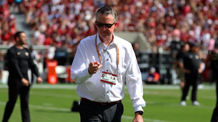 Oct 4, 2025; Tuscaloosa, Alabama, USA; Alabama Crimson Tide Athletic Director Greg Byrne greets players before a game against the Vanderbilt Commodores at Saban Field at Bryant-Denny Stadium. Mandatory Credit: David Leong-Imagn Images