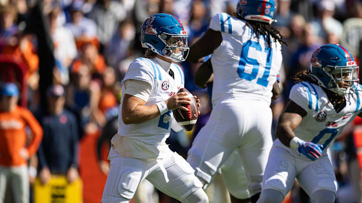Nov 23, 2024; Gainesville, Florida, USA; Mississippi Rebels quarterback Jaxson Dart (2) looks to throw against the Florida Gators during the first half at Ben Hill Griffin Stadium. Mandatory Credit: Matt Pendleton-Imagn Images Nov 23, 2024; Gainesville, Florida, USA; Mississippi Rebels quarterback Jaxson Dart (2) looks to throw against the Florida Gators during the first half at Ben Hill Griffin Stadium. Mandatory Credit: Matt Pendleton-Imagn Images