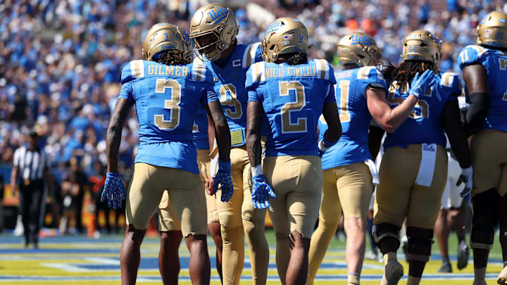 Oct 4, 2025; Pasadena, California, USA;  UCLA Bruins wide receiver Kwazi Gilmer (3) celebrates with quarterback Nico Iamaleava (9) after scoring a touchdown during the first quarter against the Penn State Nittany Lions at Rose Bowl. Mandatory Credit: Kiyoshi Mio-Imagn Images Oct 4, 2025; Pasadena, California, USA;  UCLA Bruins wide receiver Kwazi Gilmer (3) celebrates with quarterback Nico Iamaleava (9) after scoring a touchdown during the first quarter against the Penn State Nittany Lions at Rose Bowl. Mandatory Credit: Kiyoshi Mio-Imagn Images
